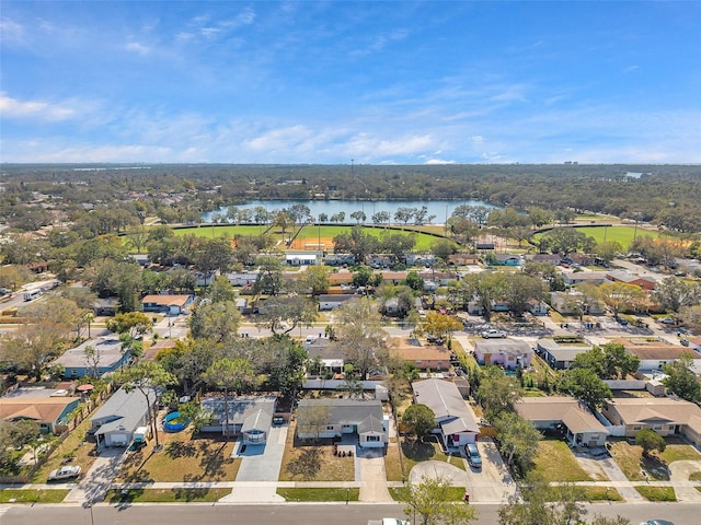 aerial view featuring a residential view and a water view