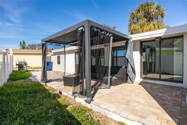 back of house with a patio