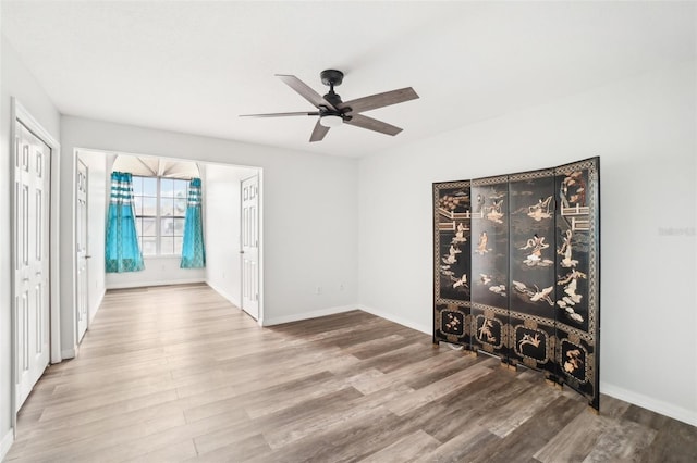 2794 Countryside Blvd Unit 1, Clearwater, FL 33761 - unfurnished room with wood finished floors and ceiling fan