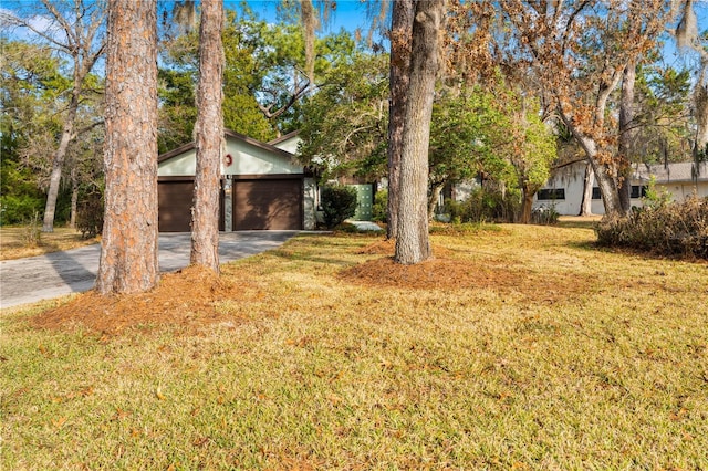 view of yard with a garage