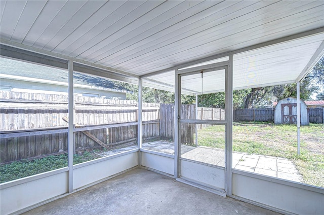 unfurnished sunroom featuring a wealth of natural light