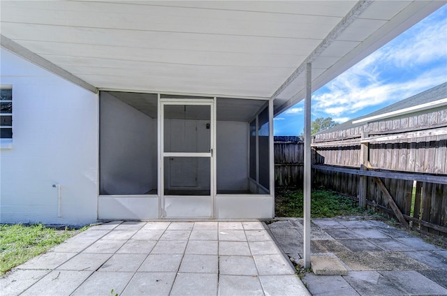 view of patio / terrace with a sunroom