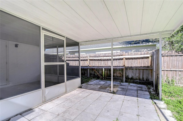 view of patio / terrace with a sunroom