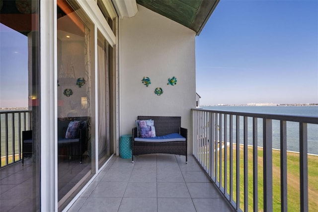 balcony featuring a water view