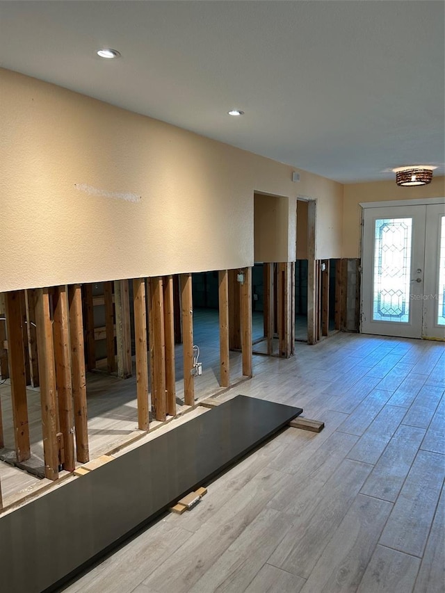 interior space featuring light hardwood / wood-style floors and french doors