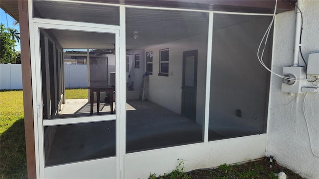 exterior space with a sunroom