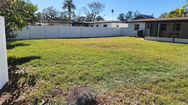 view of yard featuring a sunroom