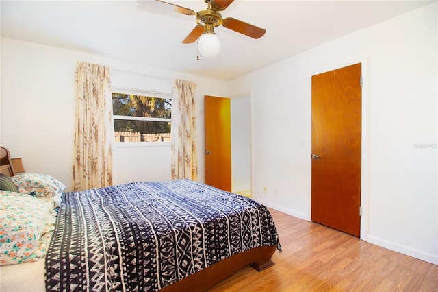 bedroom featuring light hardwood / wood-style flooring and ceiling fan