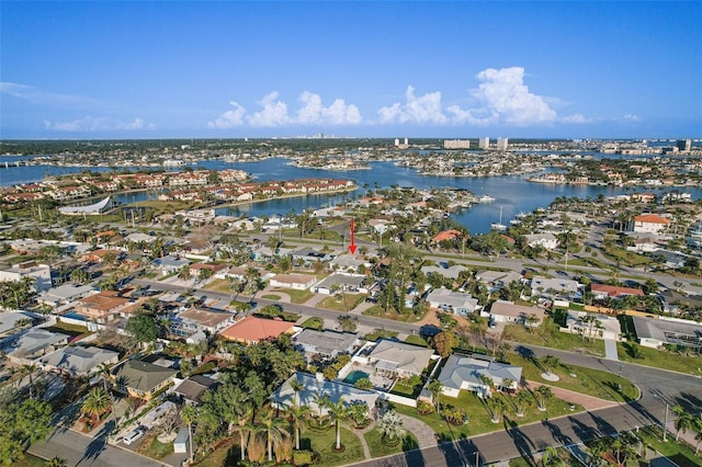 bird's eye view with a water view and a residential view