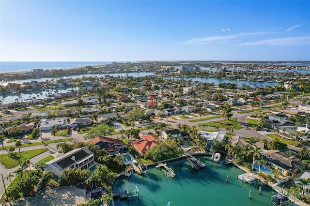 bird's eye view with a water view and a residential view