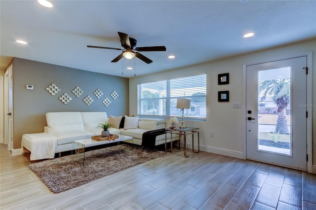 living room with ceiling fan