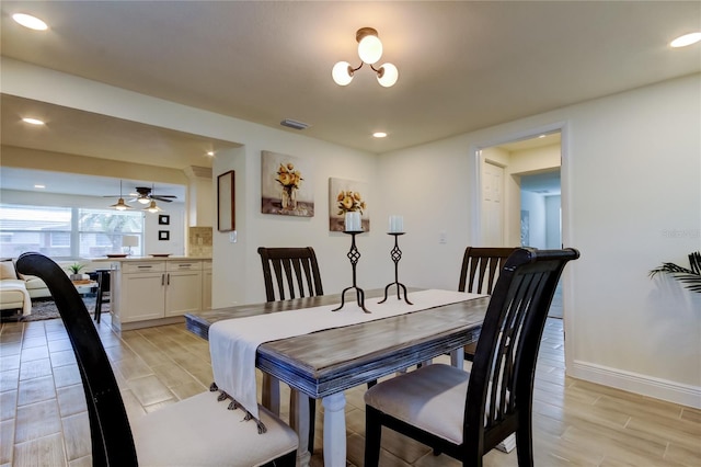 dining space featuring ceiling fan