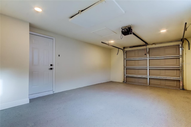 garage featuring a garage door opener