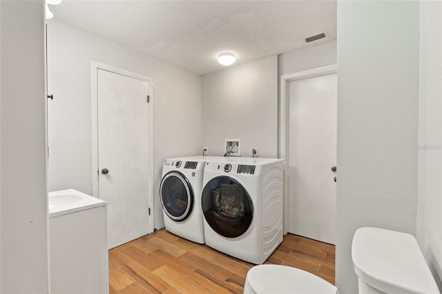 laundry area featuring separate washer and dryer