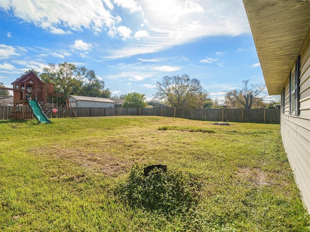 view of yard with a playground