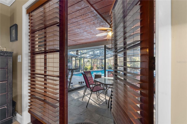 interior space featuring ceiling fan