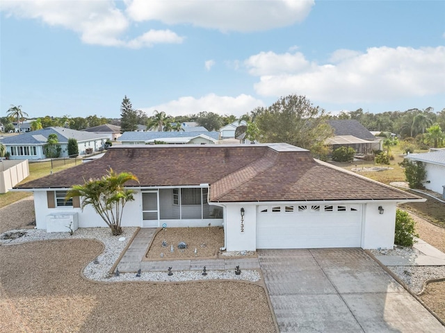 ranch-style home with a garage