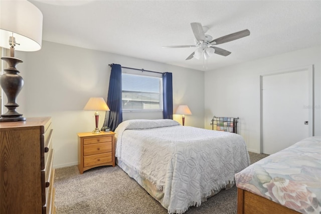 bedroom with light carpet and ceiling fan