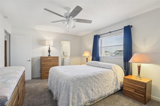 carpeted bedroom featuring ensuite bath, a textured ceiling, and ceiling fan