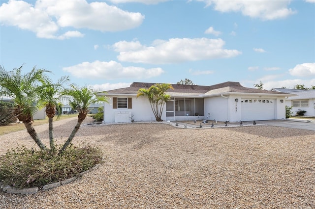 ranch-style home with a garage