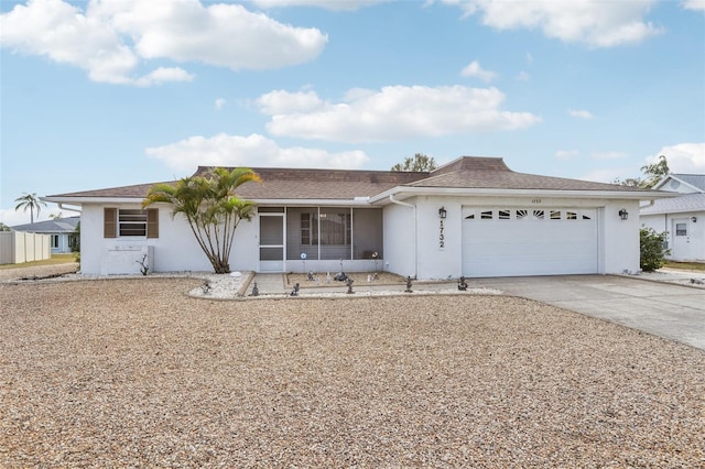 ranch-style house featuring a garage