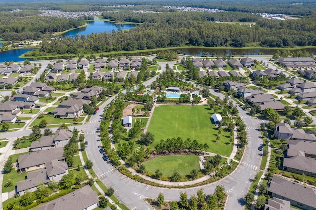 bird's eye view with a water view