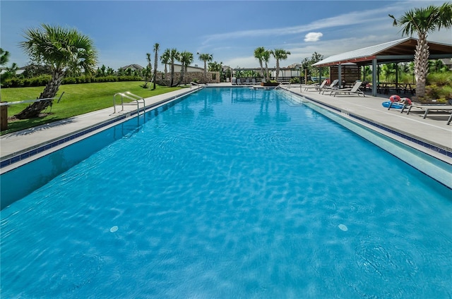 view of pool featuring a gazebo, a lawn, and a patio area