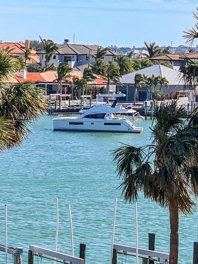 property view of water with a dock