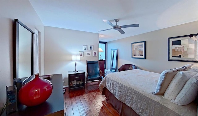 bedroom featuring dark wood-type flooring and ceiling fan