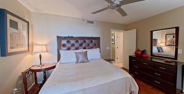 bedroom featuring dark hardwood / wood-style floors and ceiling fan