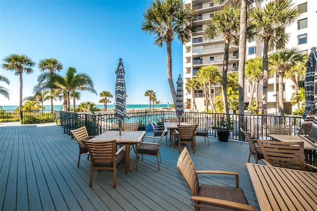 wooden deck with a water view