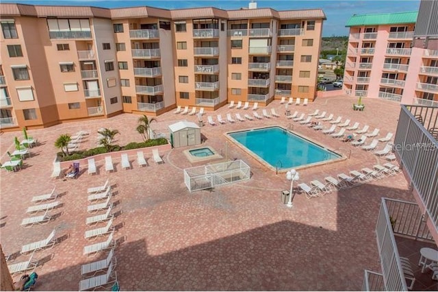 view of swimming pool featuring a patio area