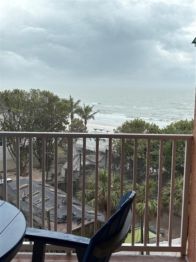 balcony featuring a water view