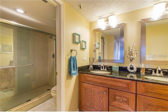 18400 Gulf Blvd Unit 1505, Indian Shores, FL 33785 - full bath with double vanity, tile patterned floors, a stall shower, and a textured ceiling
