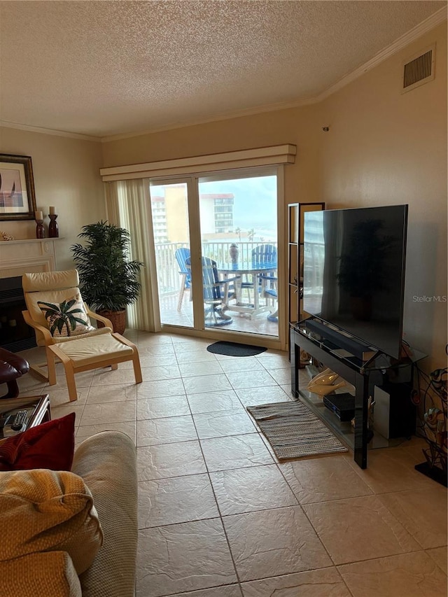 18400 Gulf Blvd Unit 1505, Indian Shores, FL 33785 - living room with ornamental molding and a textured ceiling