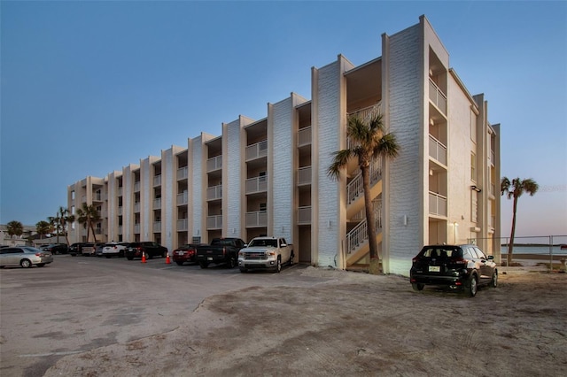 view of outdoor building at dusk