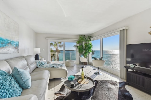 living room featuring a healthy amount of sunlight and light tile patterned floors