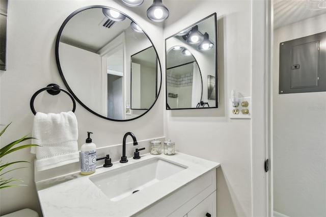 bathroom featuring vanity and electric panel