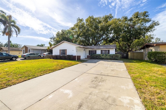 ranch-style home with a front yard