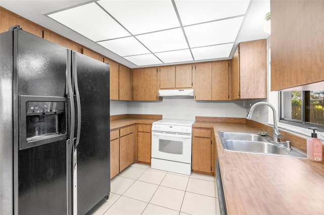 kitchen featuring sink, black fridge with ice dispenser, electric range, and light tile patterned floors