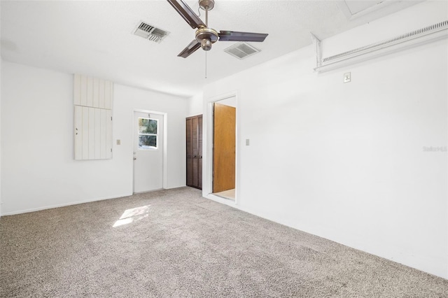 carpeted empty room with ceiling fan