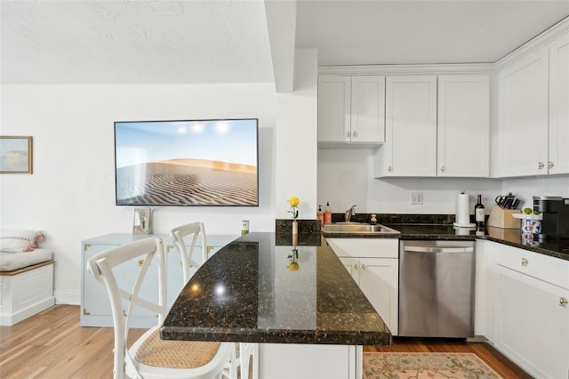 kitchen with white cabinetry and dishwasher