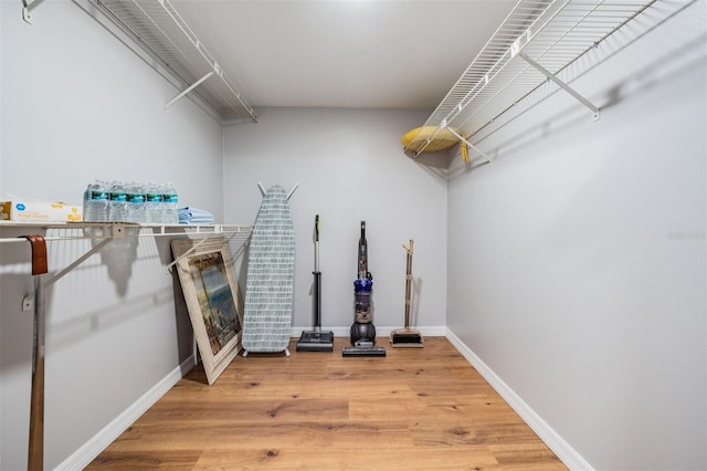 walk in closet featuring light wood-type flooring