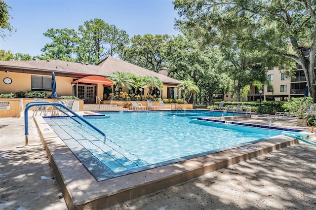 pool with a patio