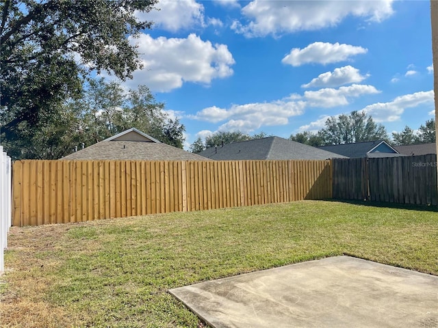 view of yard with a patio area