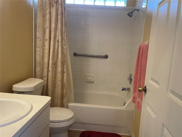 full bathroom featuring toilet, vanity, and shower / bathtub combination with curtain