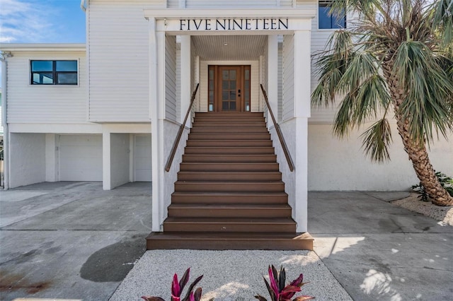 property entrance featuring a garage