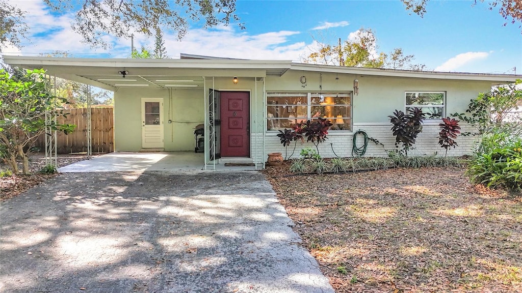 view of front of home featuring a carport