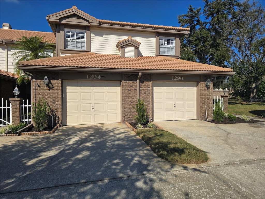 view of front of home with a garage