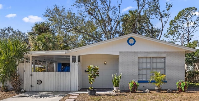 single story home with a carport